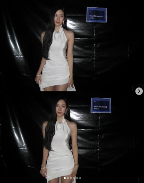 white halter dress actress Royalty-Free photo: Woman in white halter-top dress