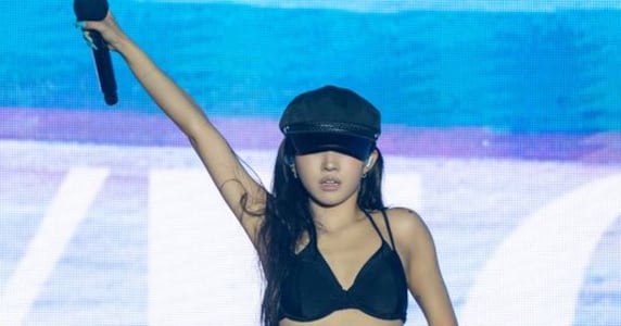 Photo: biz.chosun.com Soyeon Previews Catchy 'Vegetables Song' and New Tracks at Waterbomb Sokcho 2026