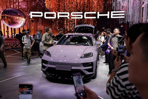 Porsche's electric Macan Turbo is displayed at a booth at the Beijing International Automotive Exhibition (Auto China 2024) in Beijing on April 25, 2024. /Courtesy of Yonhap News